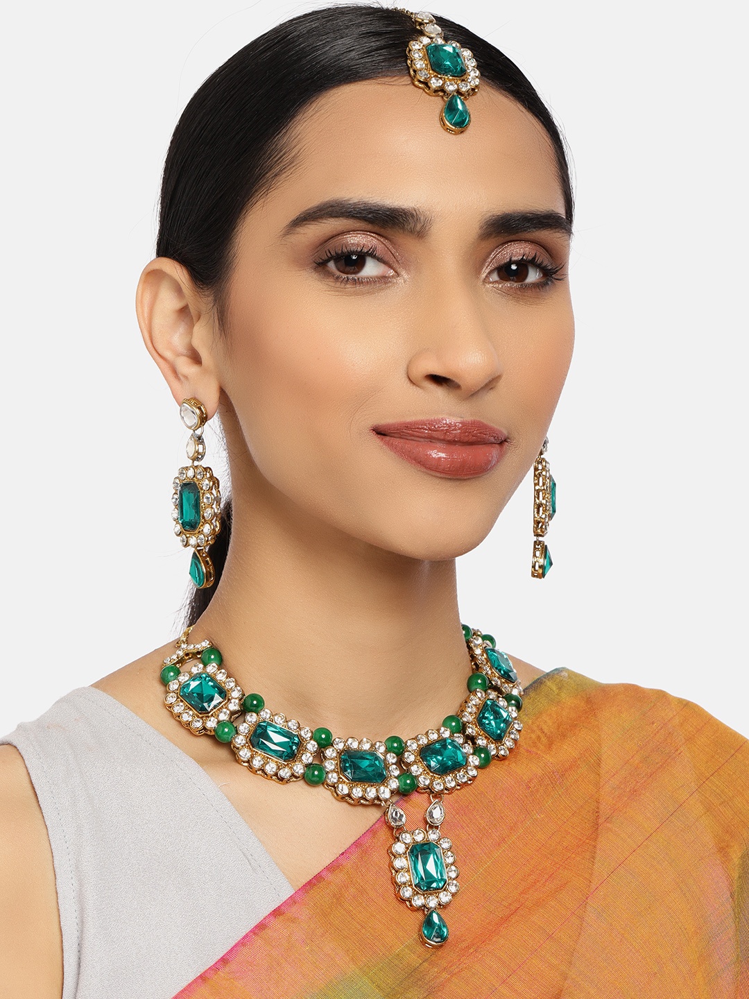 

Zaveri Pearls Green Gold-Plated Stone Studded Jewellery Set