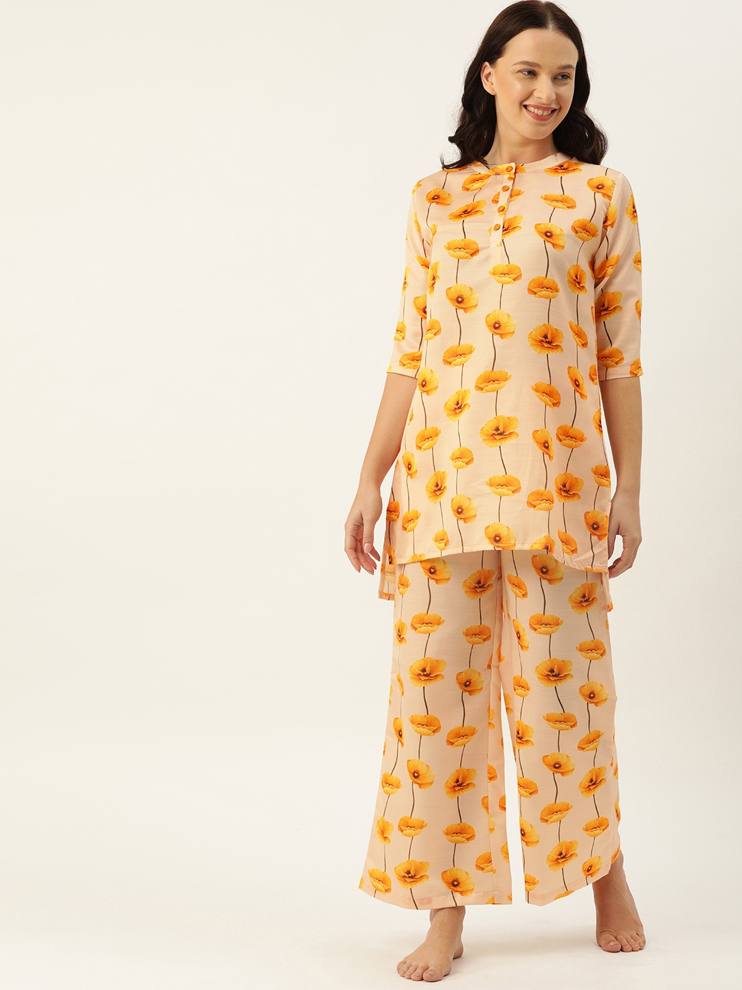 

Clt.s Women Peach-Coloured & Yellow Printed Kurta Night suit