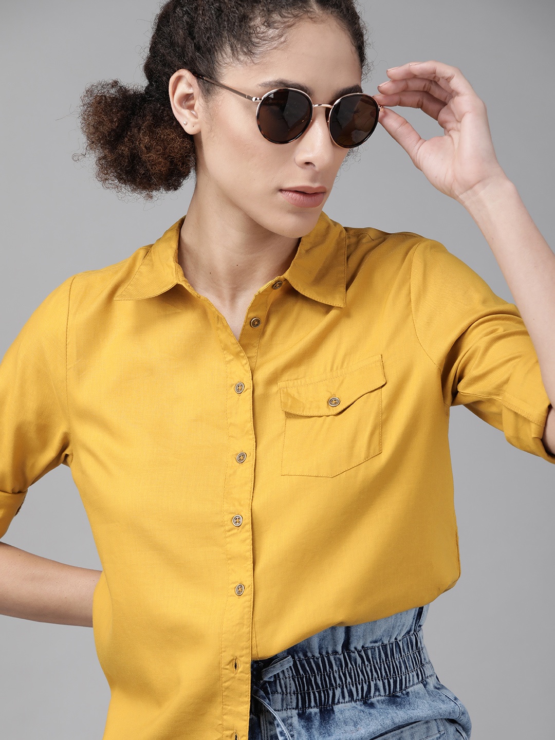 

The Roadster Lifestyle Co Women EcoVero Mustard Yellow Solid Sustainable Shirt