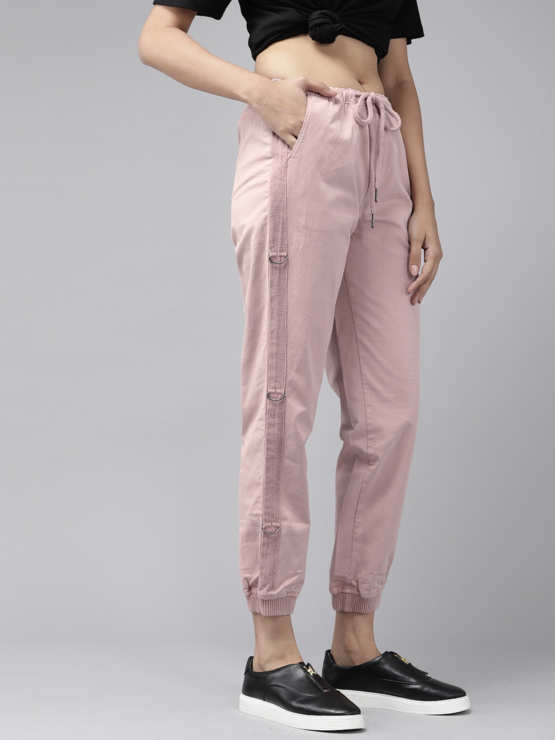 

The Roadster Lifestyle Co Women Pink Solid Jogger Sustainable Trousers