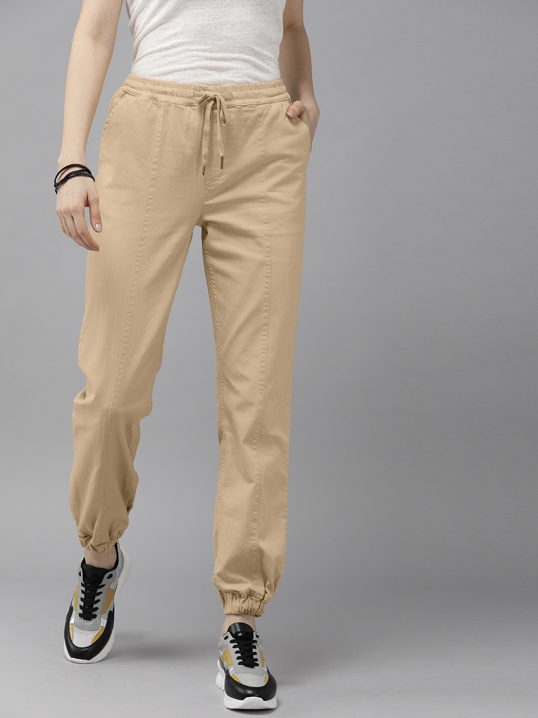

The Roadster Lifestyle Co Women Cream-Coloured High-Rise Joggers Trousers