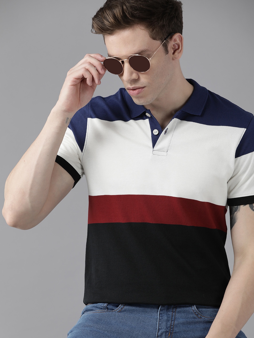 

Roadster Men Black & Beige Pure Cotton Striped Polo T-shirt