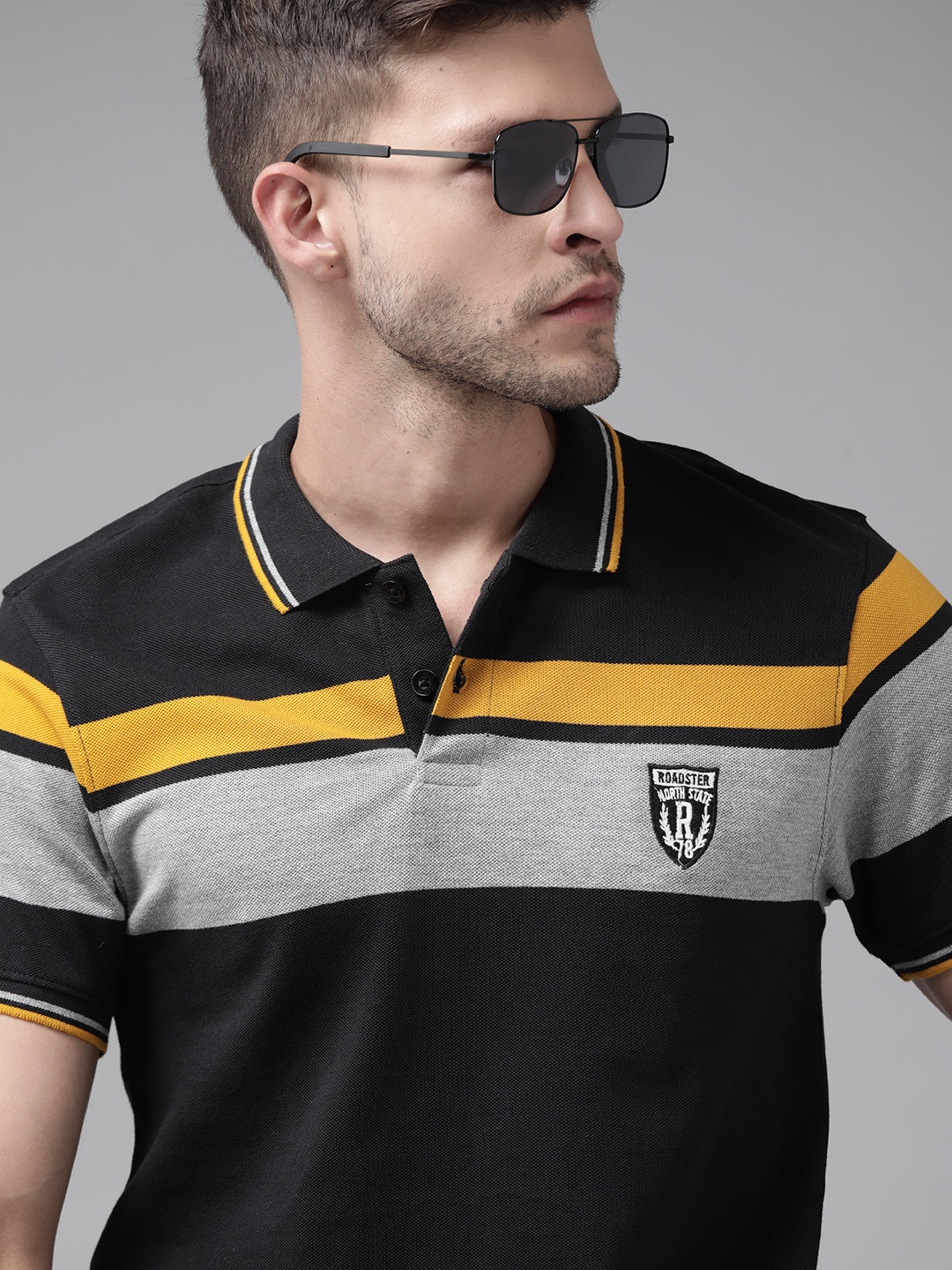

Roadster Men Black & Mustard Yellow Colourblocked Polo Collar Pure Cotton T-shirt