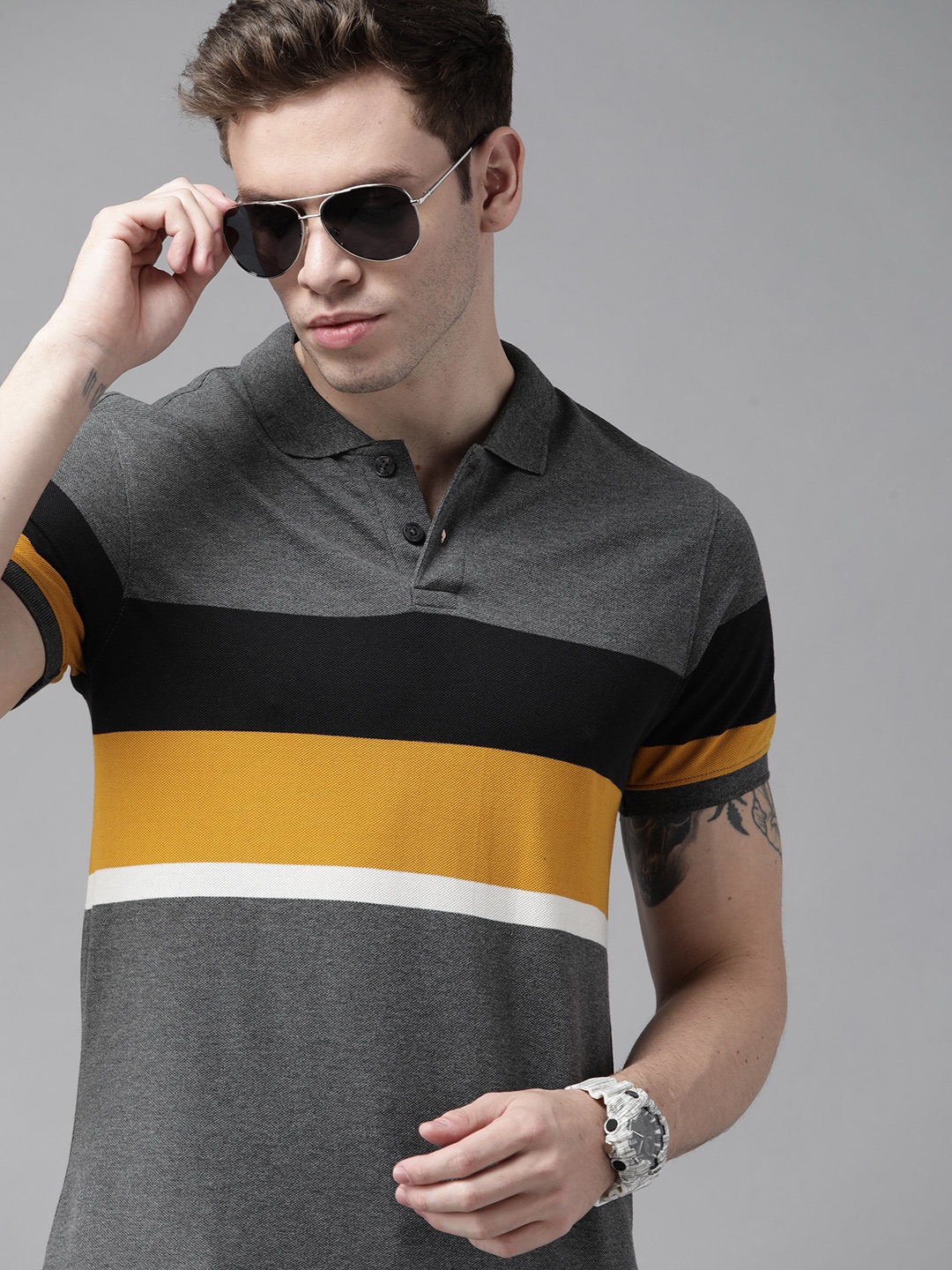 

Roadster Men Grey Melange & Mustard Yellow Striped Polo Collar Pure Cotton T-shirt