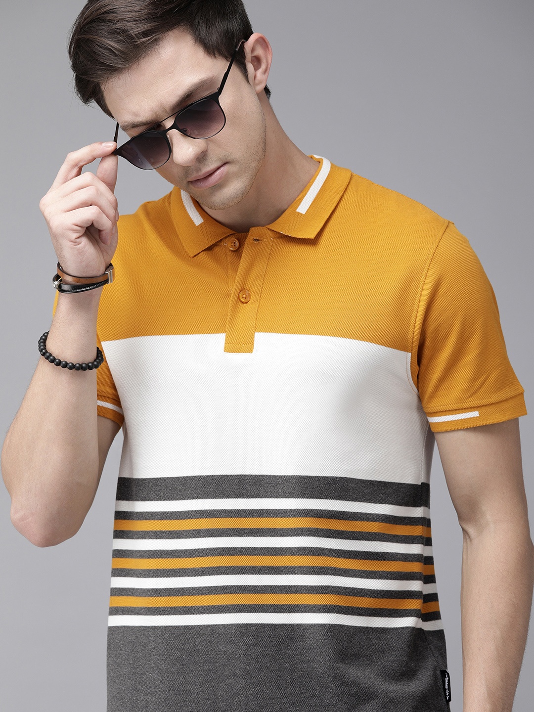 

The Roadster Lifestyle Co Men Mustard Yellow White Colourblocked Polo Collar Pure Cotton T-shirt