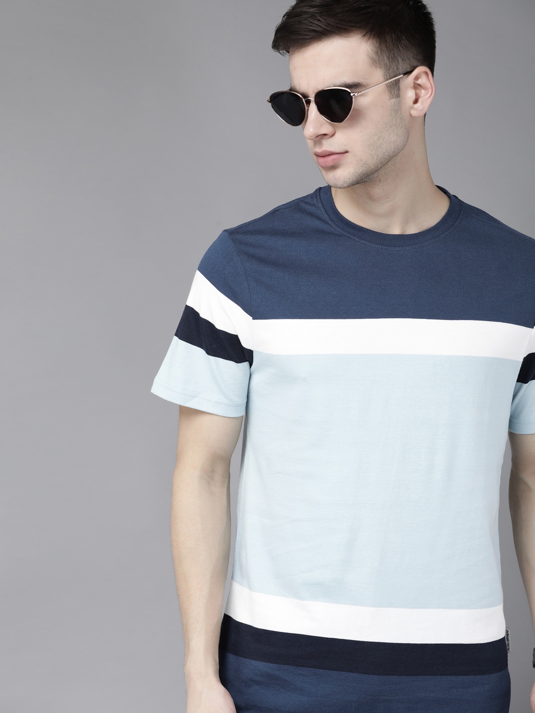 

The Roadster Lifestyle Co Men Blue White Colourblocked Pure Cotton T-shirt