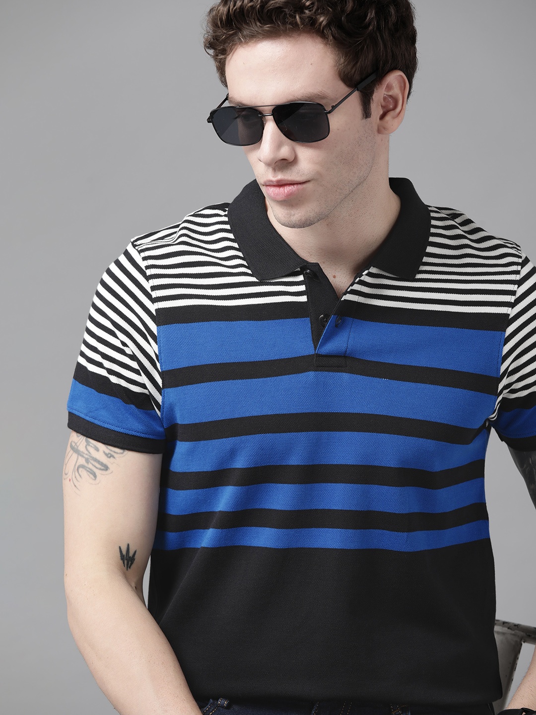 

Roadster Men Black & Blue Striped Polo Collar Pure Cotton T-shirt