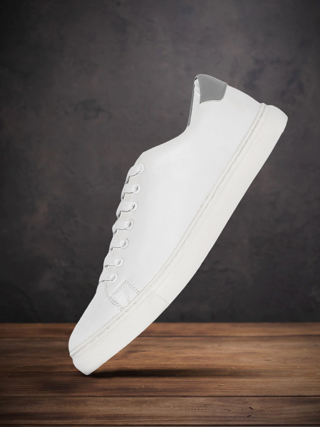 

Roadster Men White Solid Sneakers