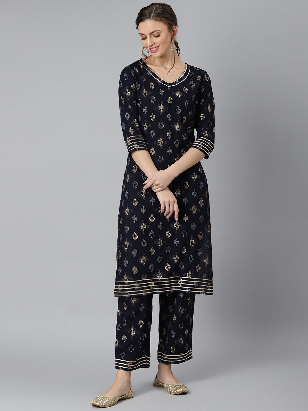 

Khushal K Women Navy Blue Printed Kurta with Palazzos
