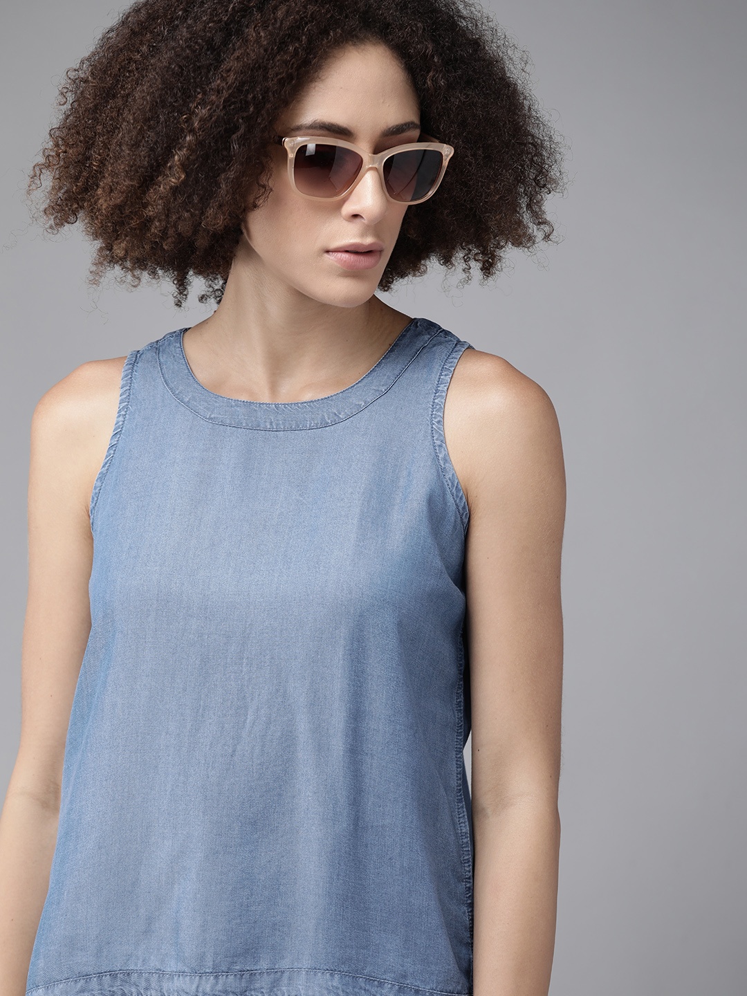 

The Roadster Lifestyle Co Blue Solid Chambray Styled Back Top