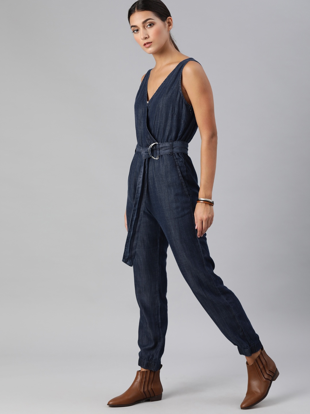 

The Roadster Lifestyle Co Women Dark Blue Tencel Denim Jumpsuit With Shell Fabric Belt