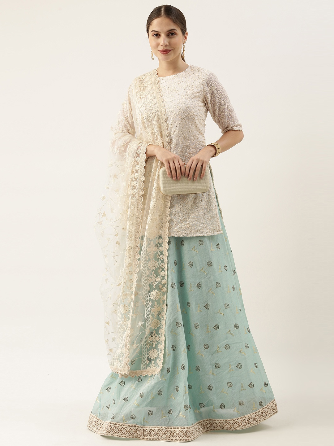 

Ethnovog Off White Turquoise Blue Embroidered Sequinned Made to Measure Lehenga Blouse With Dupatta