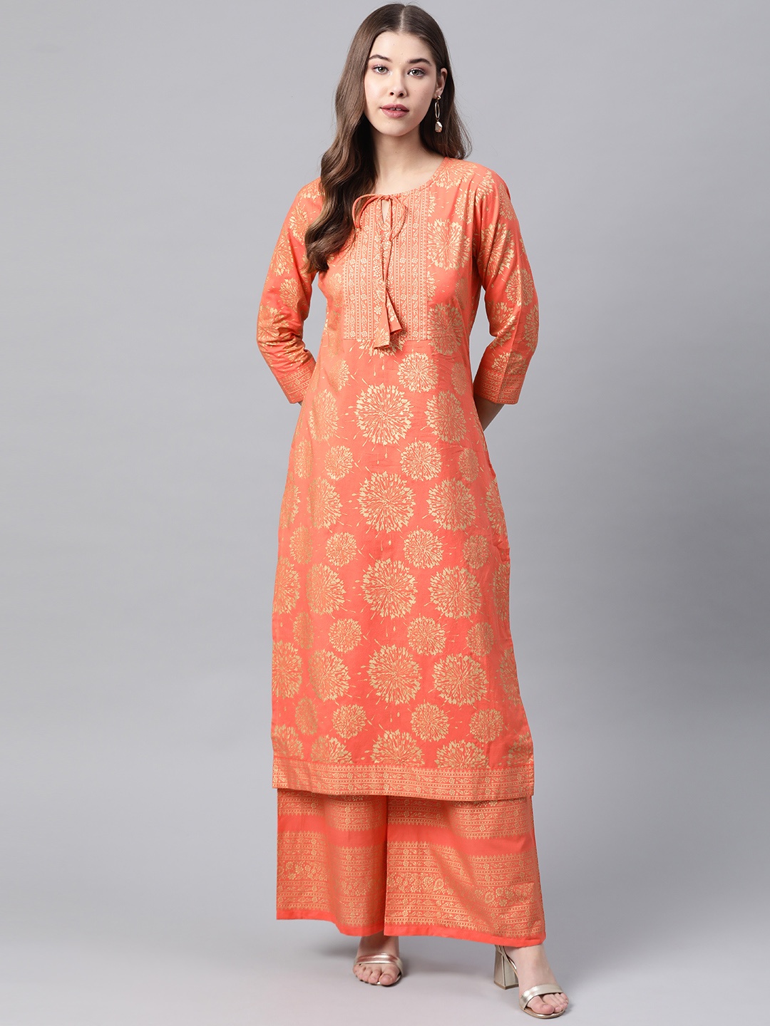 

Meeranshi Women Coral Orange & Golden Printed Pure Cotton Kurta with Palazzos