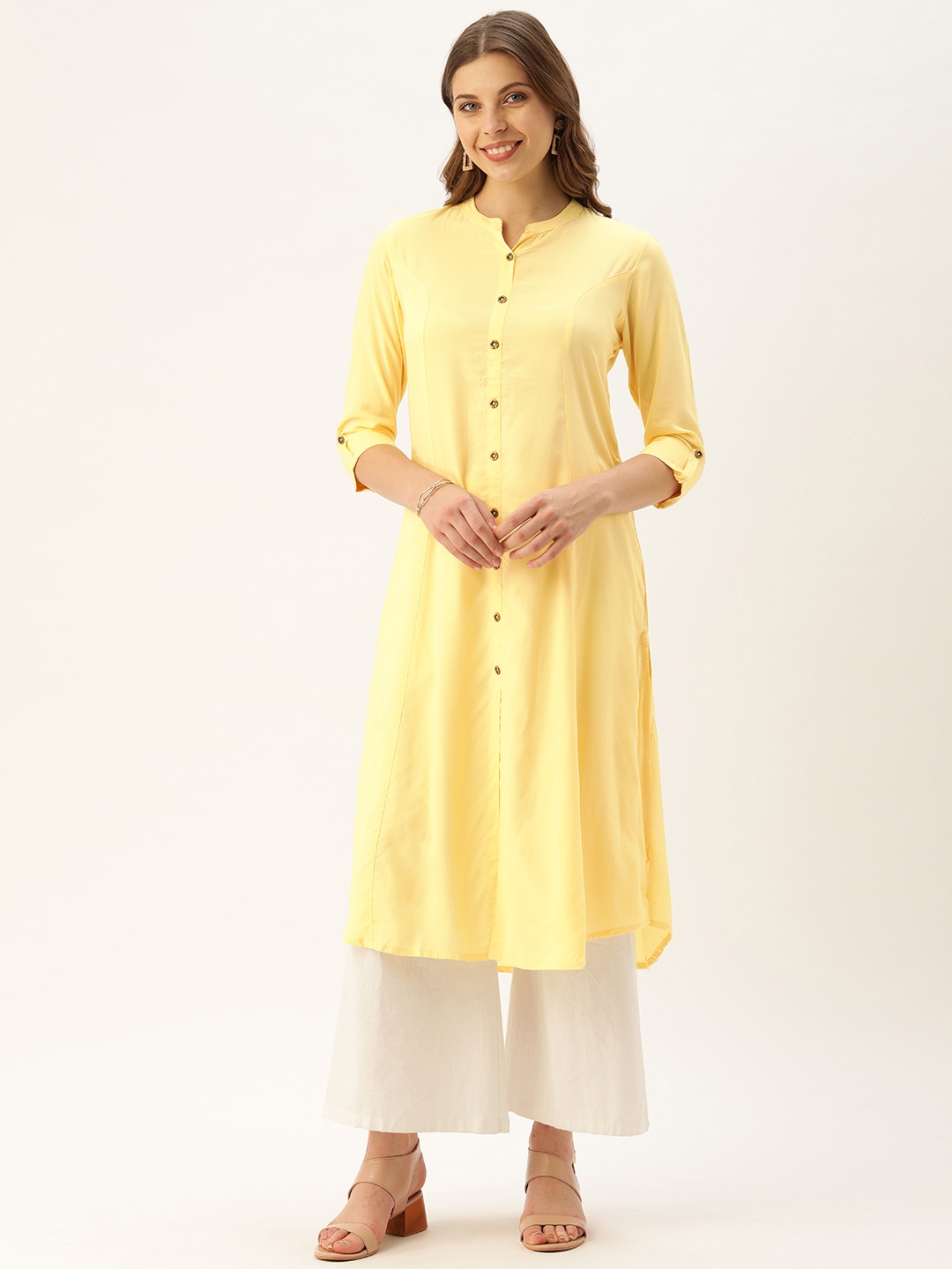 

AMUKTI Women Yellow Solid Panelled A-Line Kurta