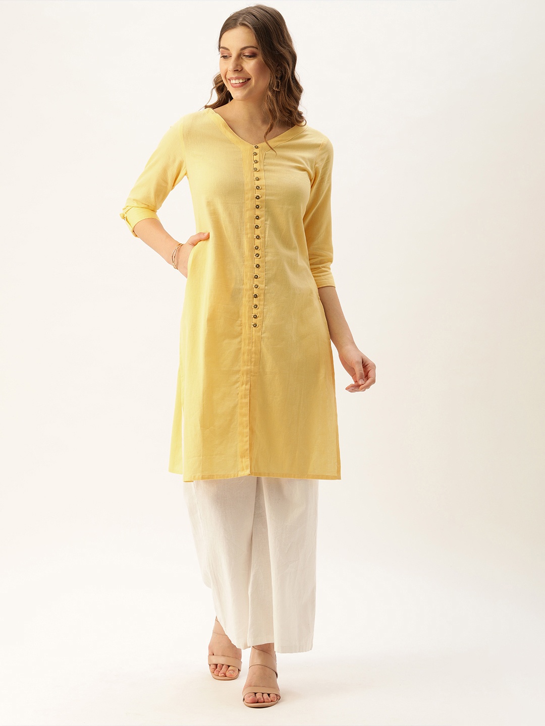 

AMUKTI Women Yellow Solid Straight Kurta