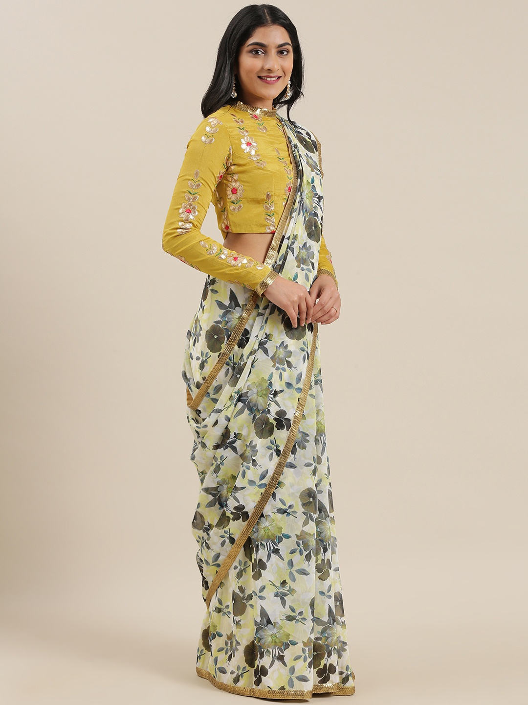 

Ethnovog Green Beige Floral Printed Saree