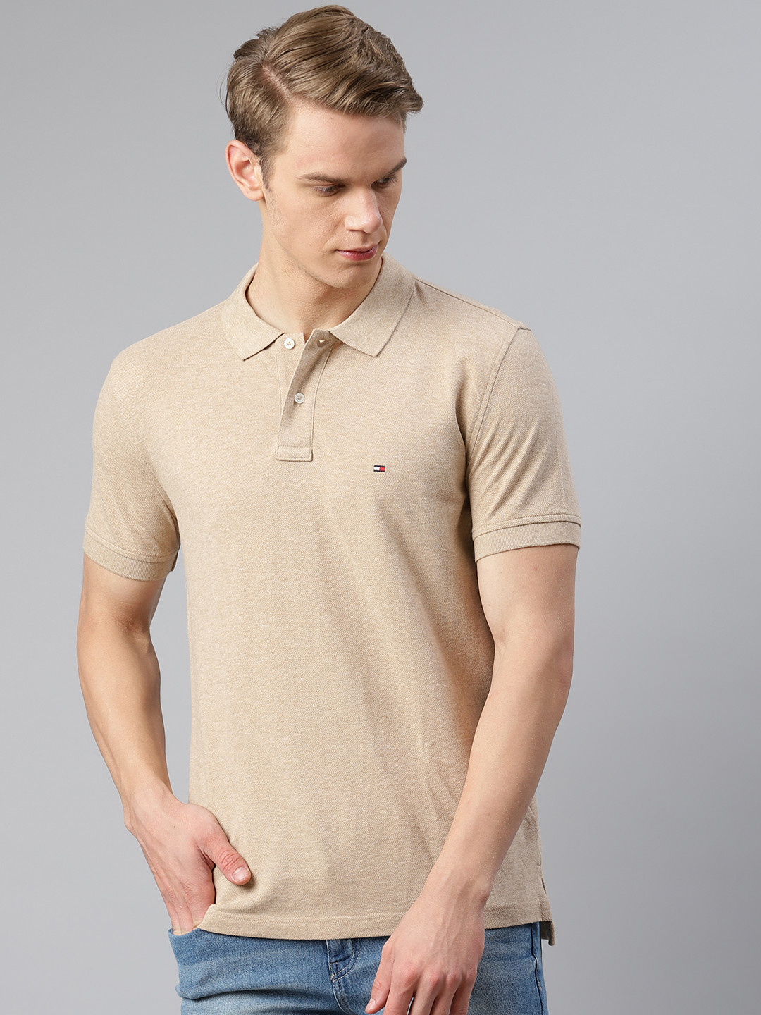 

Tommy Hilfiger Men Beige Solid Pure Cotton Polo Collar T-shirt