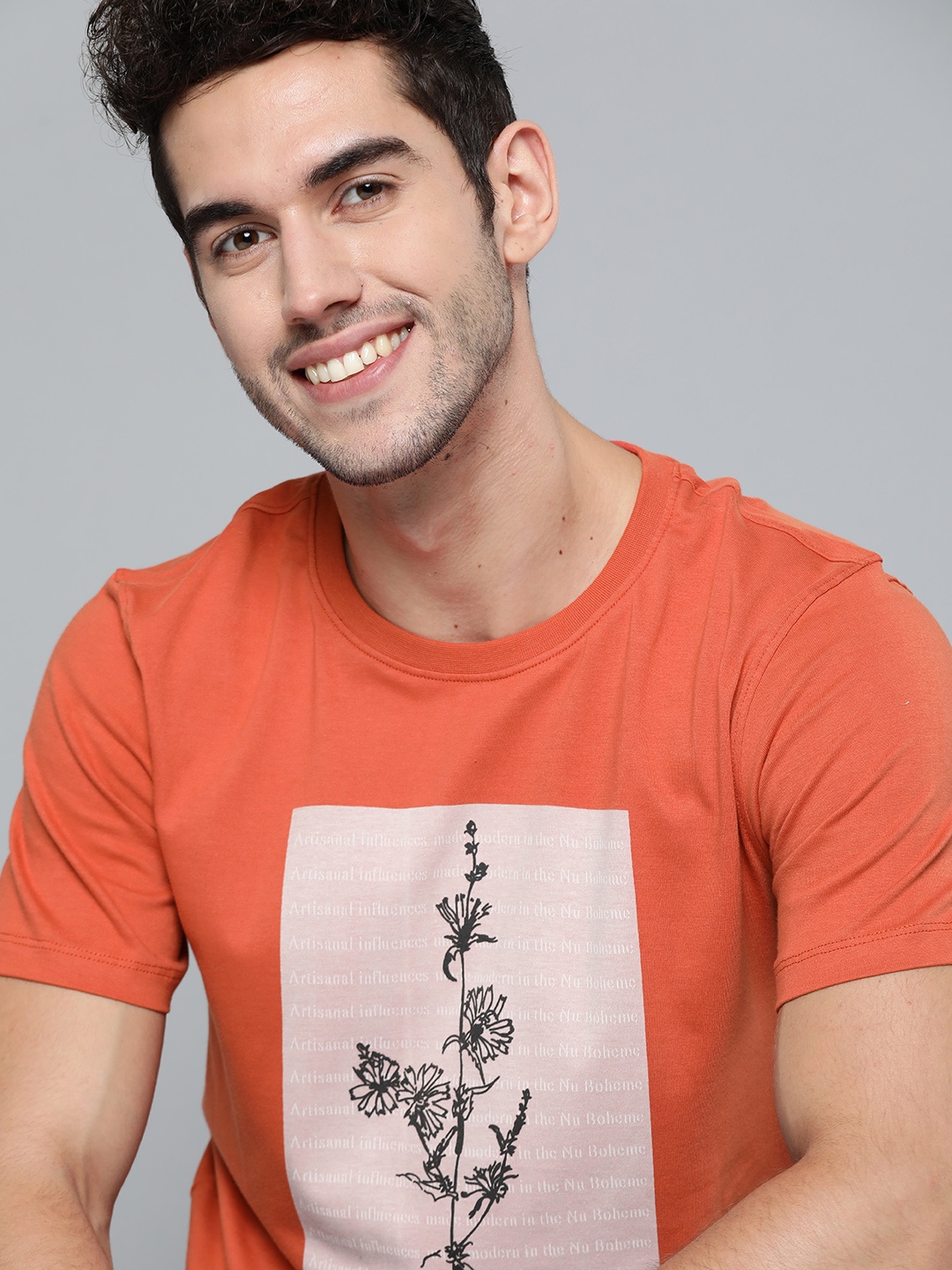 

Mast & Harbour Men Rust Orange & Off-White Printed Round Neck T-shirt