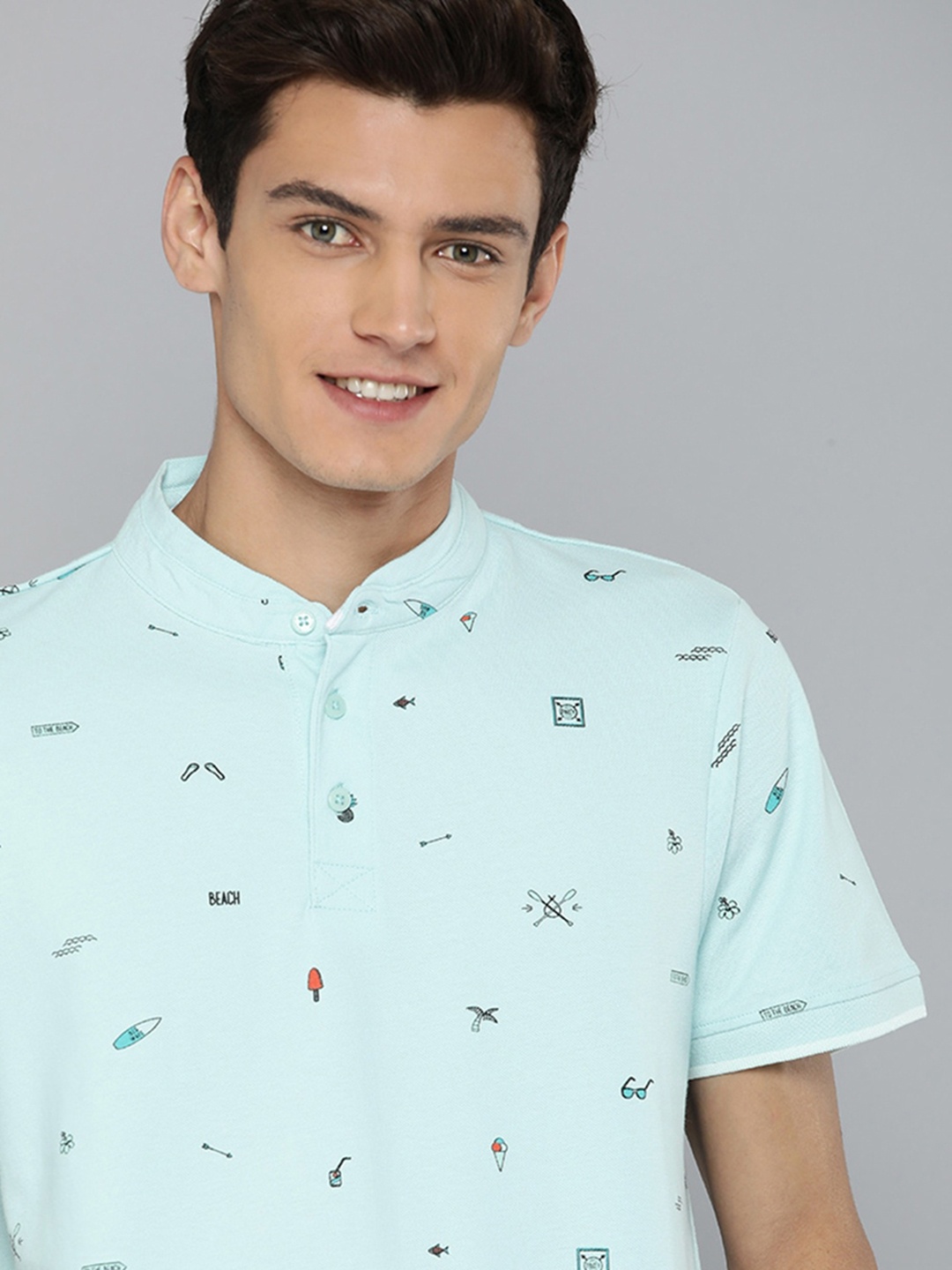 

Mast & Harbour Men Blue & Black Printed Stand Collar Pure Cotton T-shirt