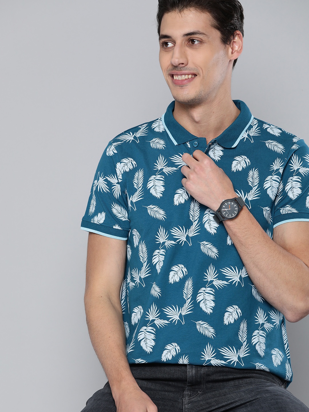 

Mast & Harbour Men Teal Blue & White Pure Cotton Tropical Printed Polo Collar T-shirt