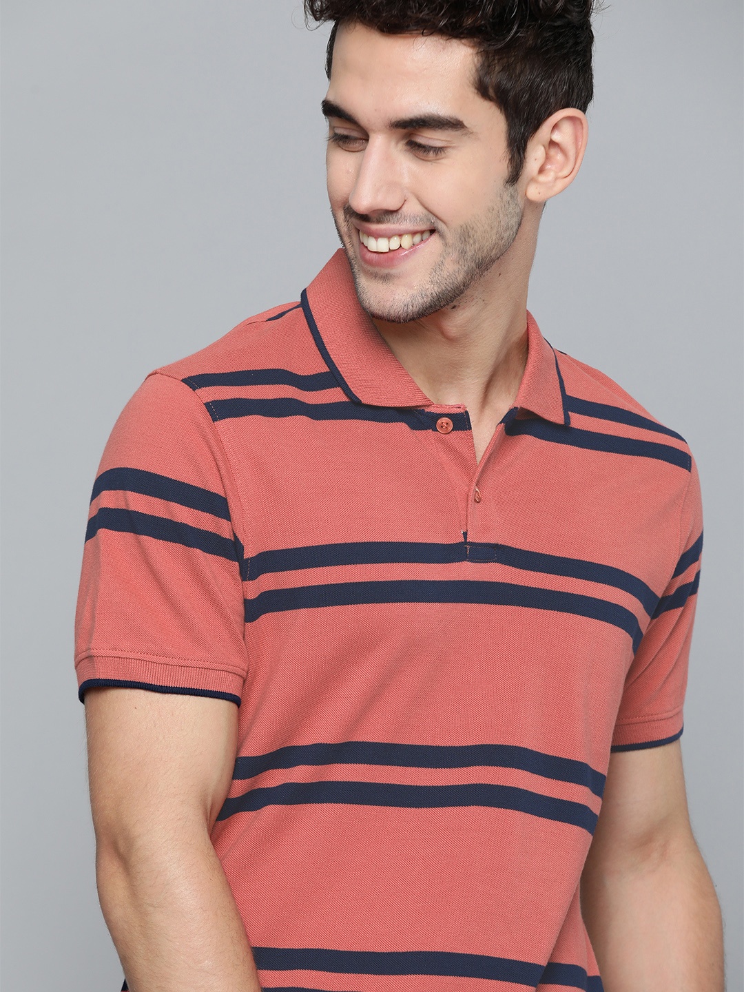

Mast & Harbour Men Pink & Navy Blue Striped Cotton Polo Collar T-shirt