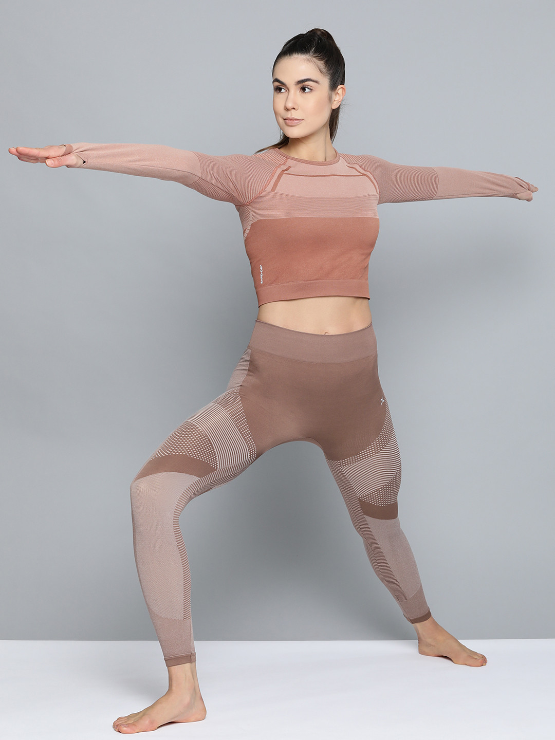 

HRX By Hrithik Roshan Women Twillight Mauve Solid Skinny Fit Seamless Rapid-Dry Antimicrobial Yoga Tights, Brown