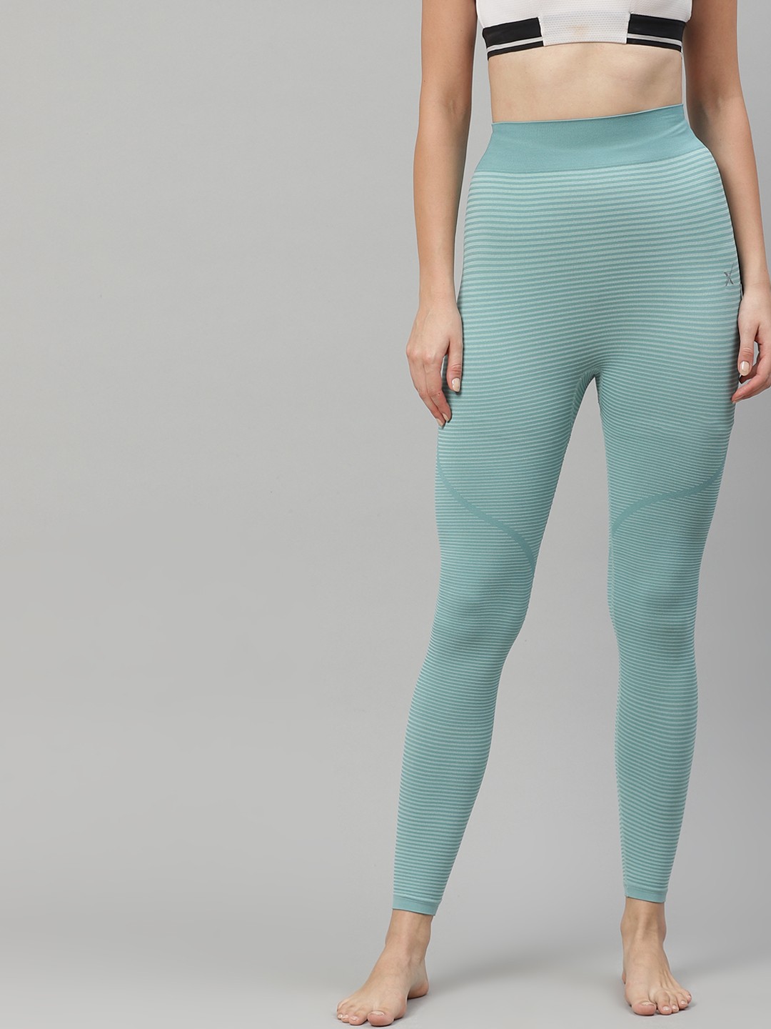 

HRX By Hrithik Roshan Women Aquifier Striped Skinny Fit Seamless Rapid-Dry Yoga Tights, Blue