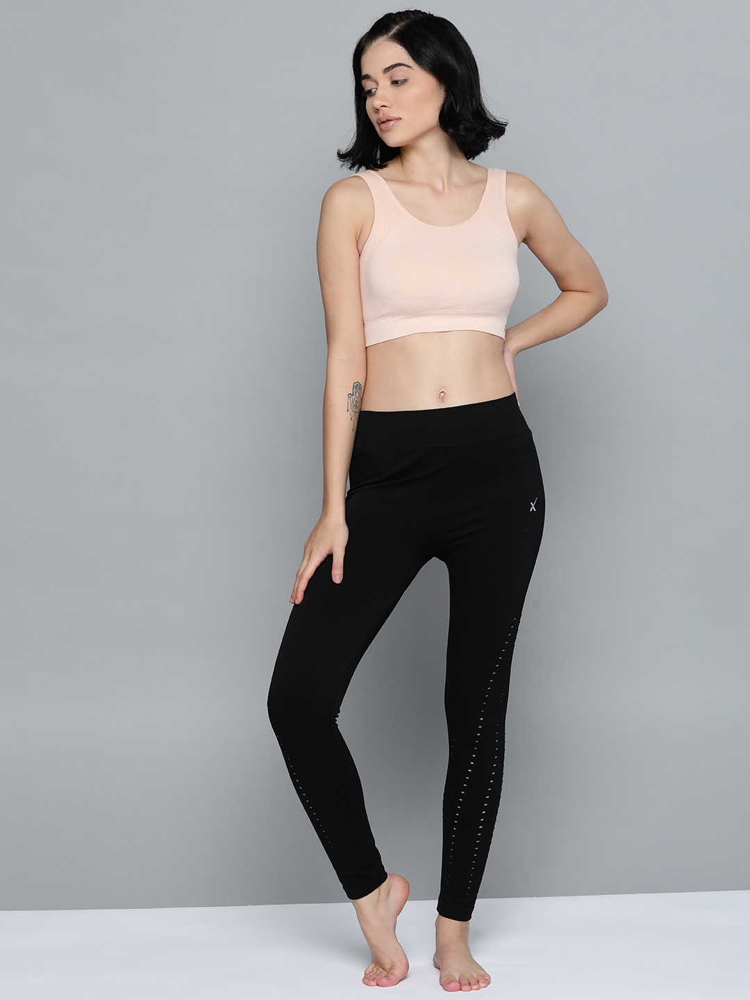 

HRX By Hrithik Roshan Women Peach Melange Solid Seamless Rapid-Dry Yoga Bra