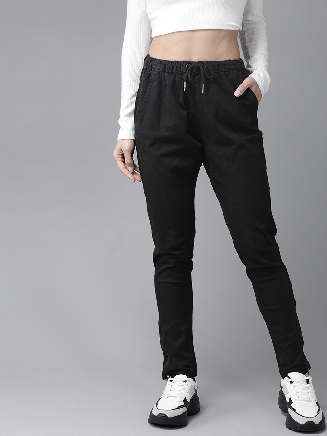 

The Roadster Lifestyle Co Women Black Knitted Relaxed Fit Solid Regular Trousers