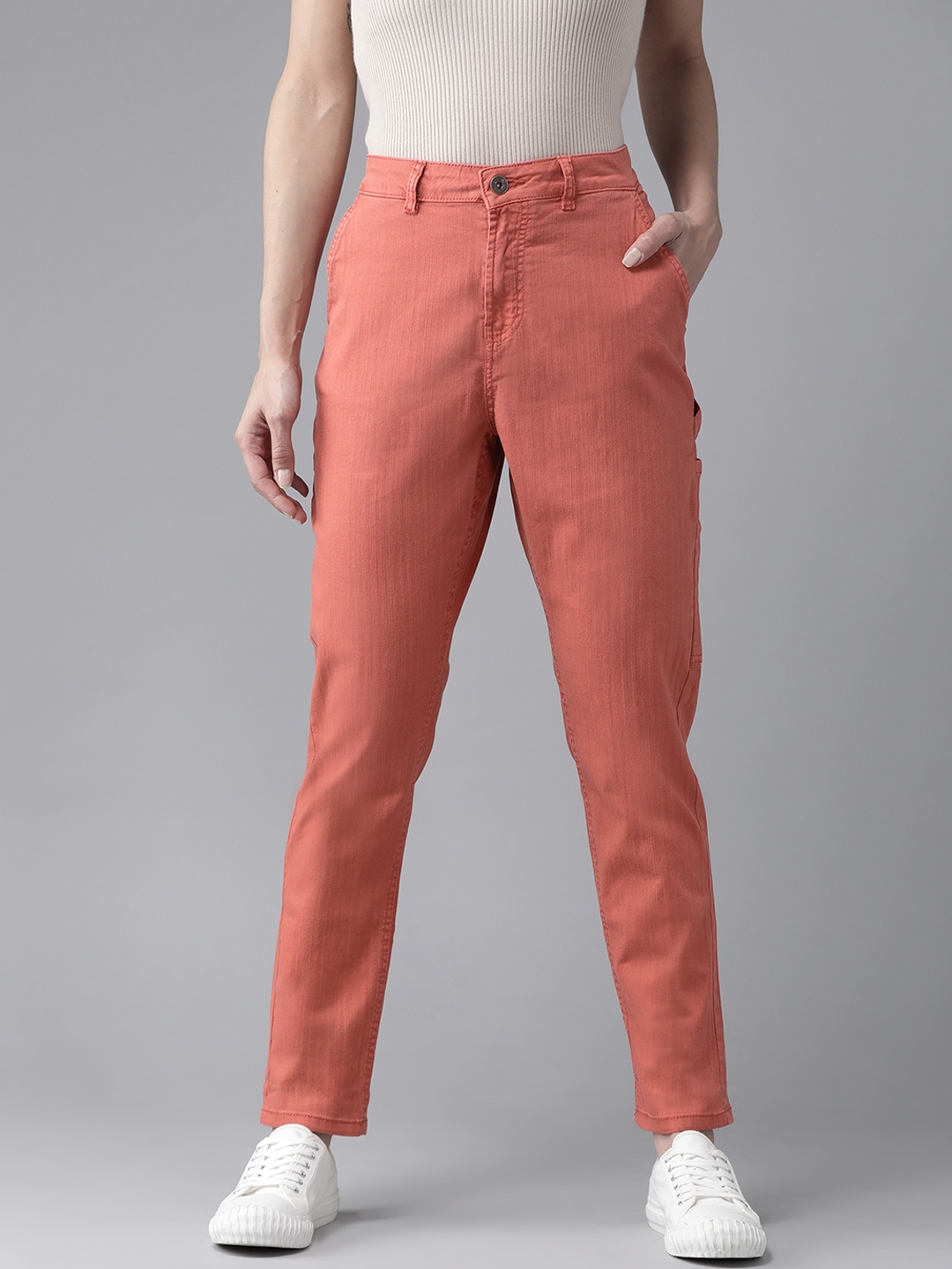 

The Roadster Lifestyle Co Women Coral Pink Loose Fit Solid Regular Trousers