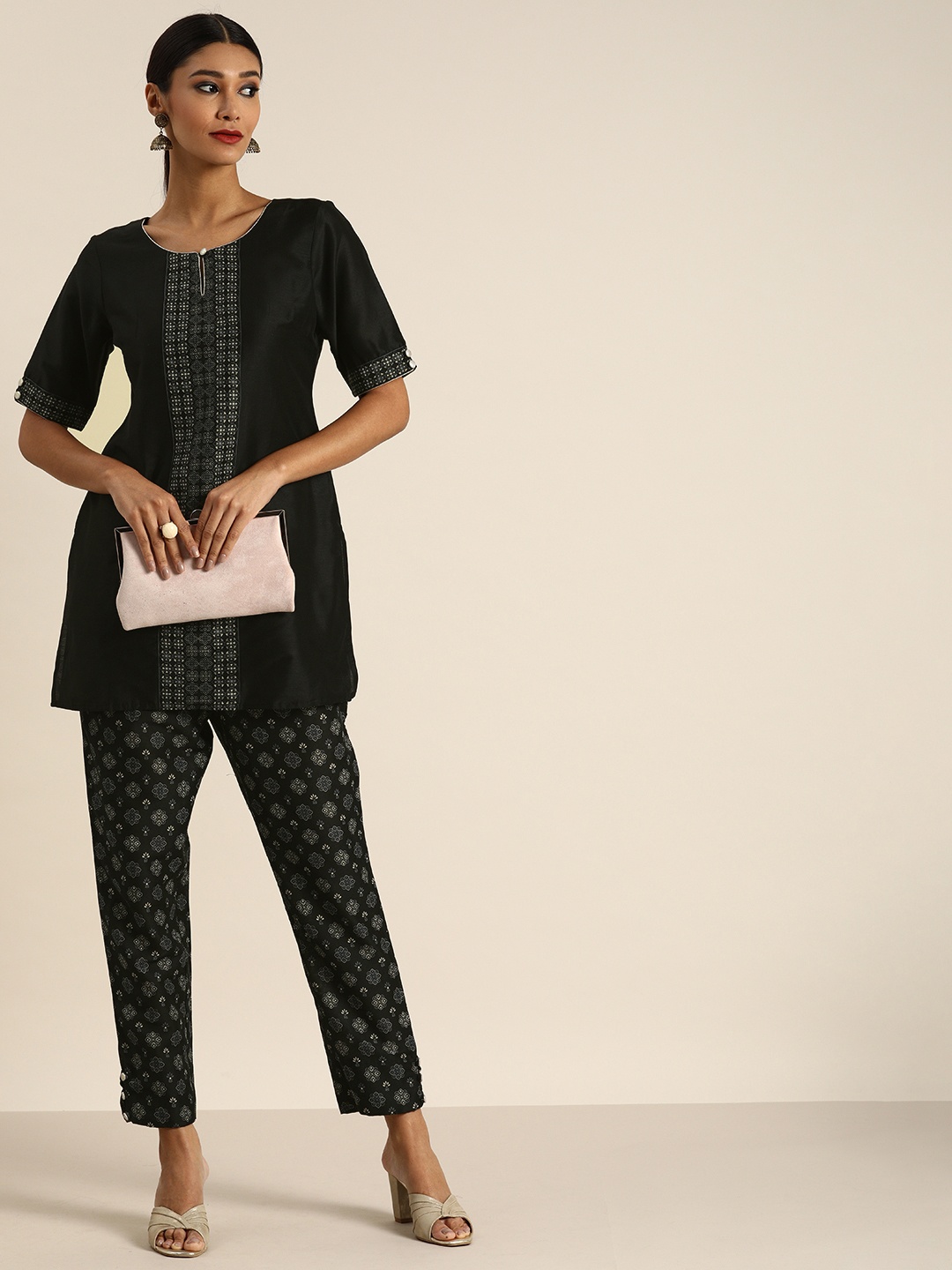 

all about you Women Black & Off-White Ethnic Motifs Print Kurti with Trousers