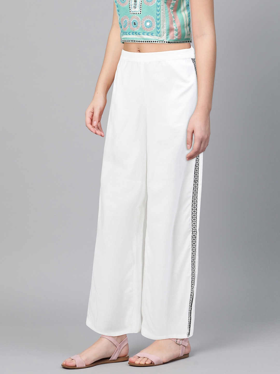 

Global Desi Women White Regular Fit Solid Parallel Trousers with Side Stripe