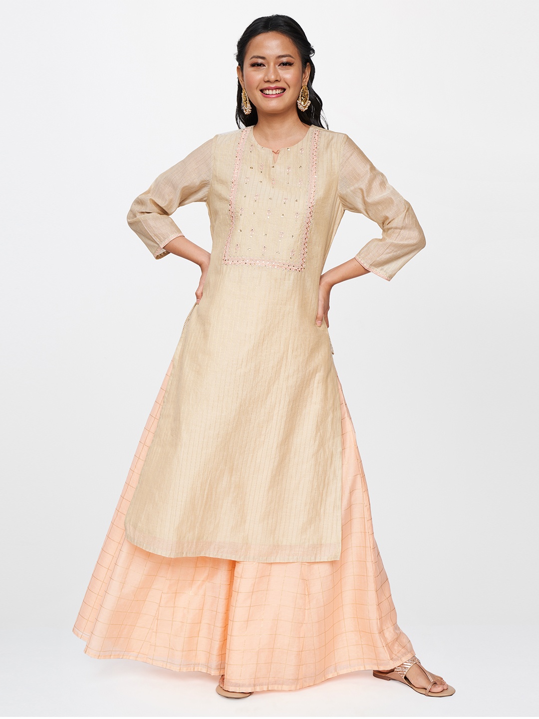 

Global Desi Women Beige Yoke Design Thread Work Kurta with Palazzos
