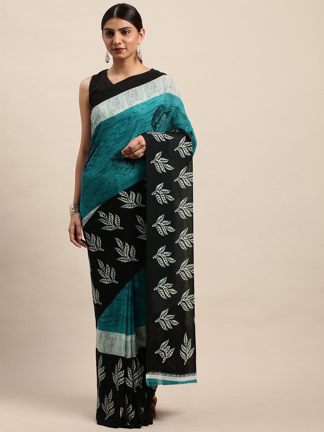 

Shaily Turquoise Blue & Black Printed Saree