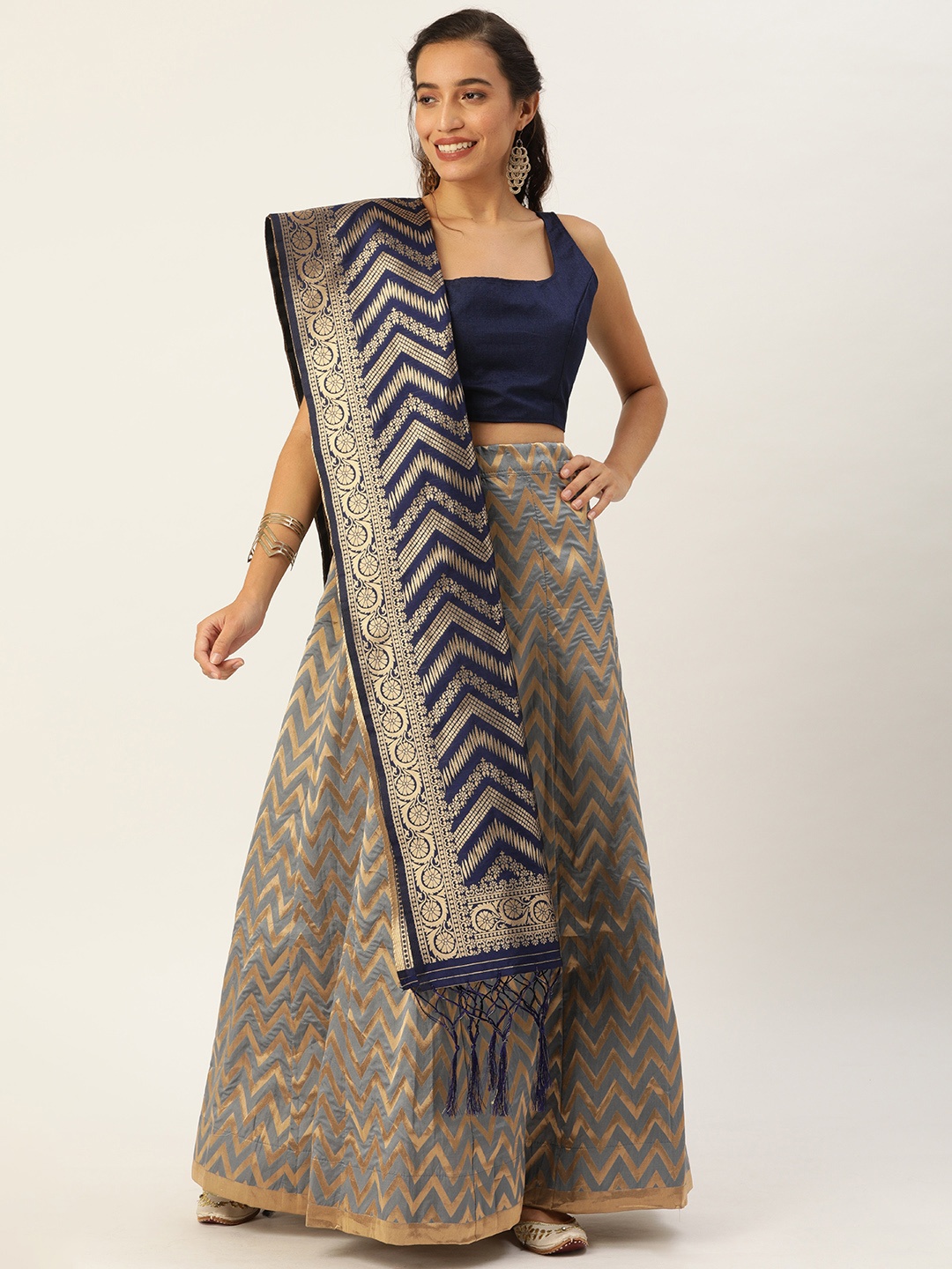 

Shaily Grey & Golden Solid Semi-Stitched Lehenga & Unstitched Blouse with Dupatta