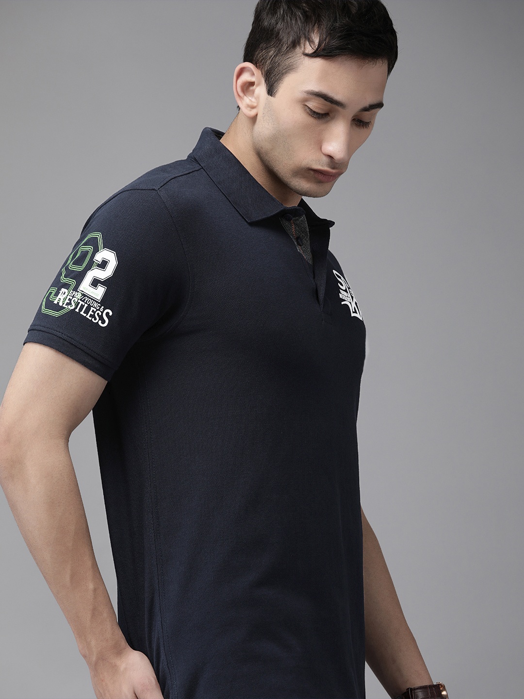 

SPYKAR Men Navy Blue Solid Polo Collar Pure Cotton T-shirt with Print Detail