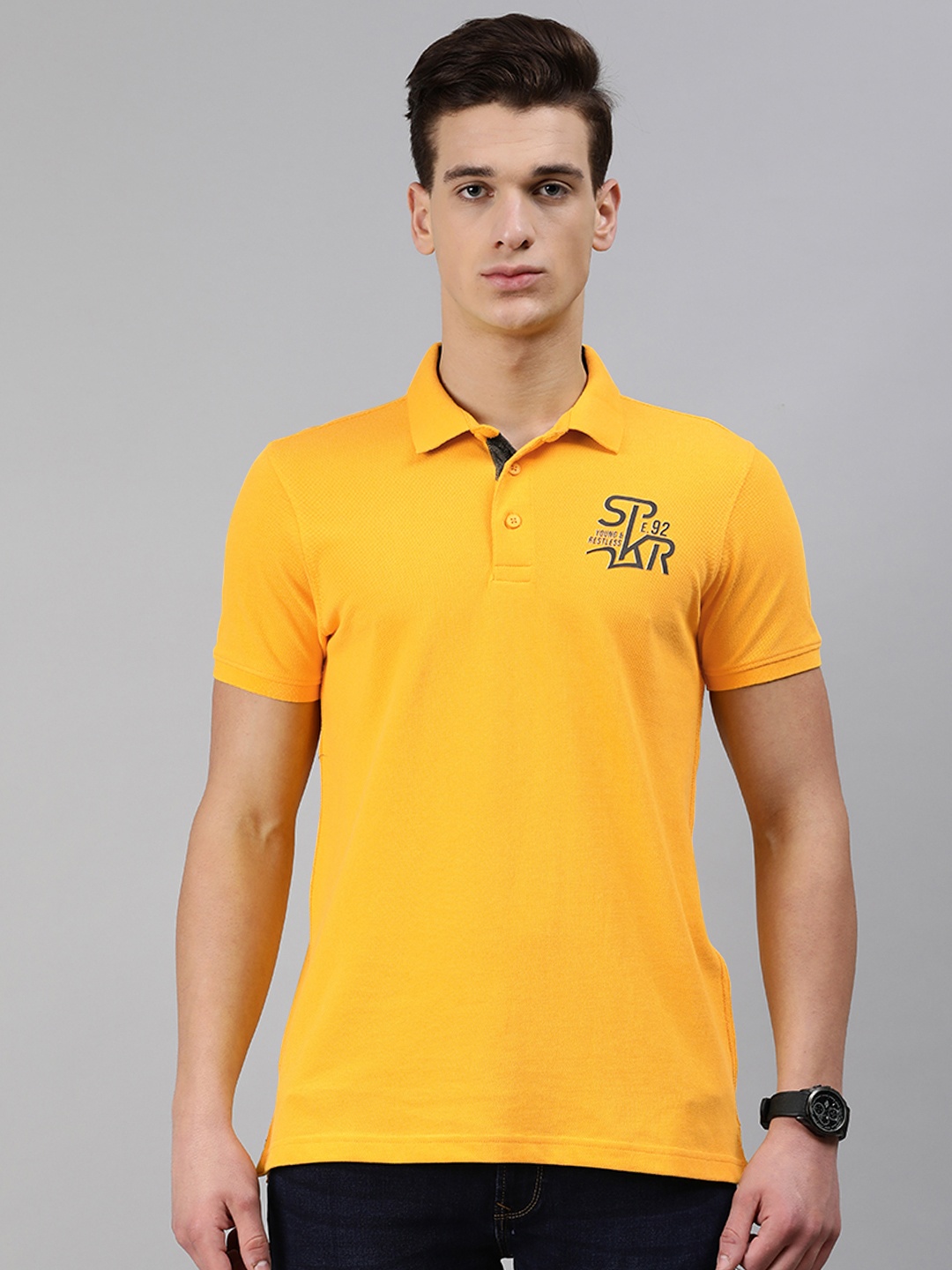 

SPYKAR Men Mustard Yellow Solid Polo Collar Pure Cotton T-shirt with Printed Detail
