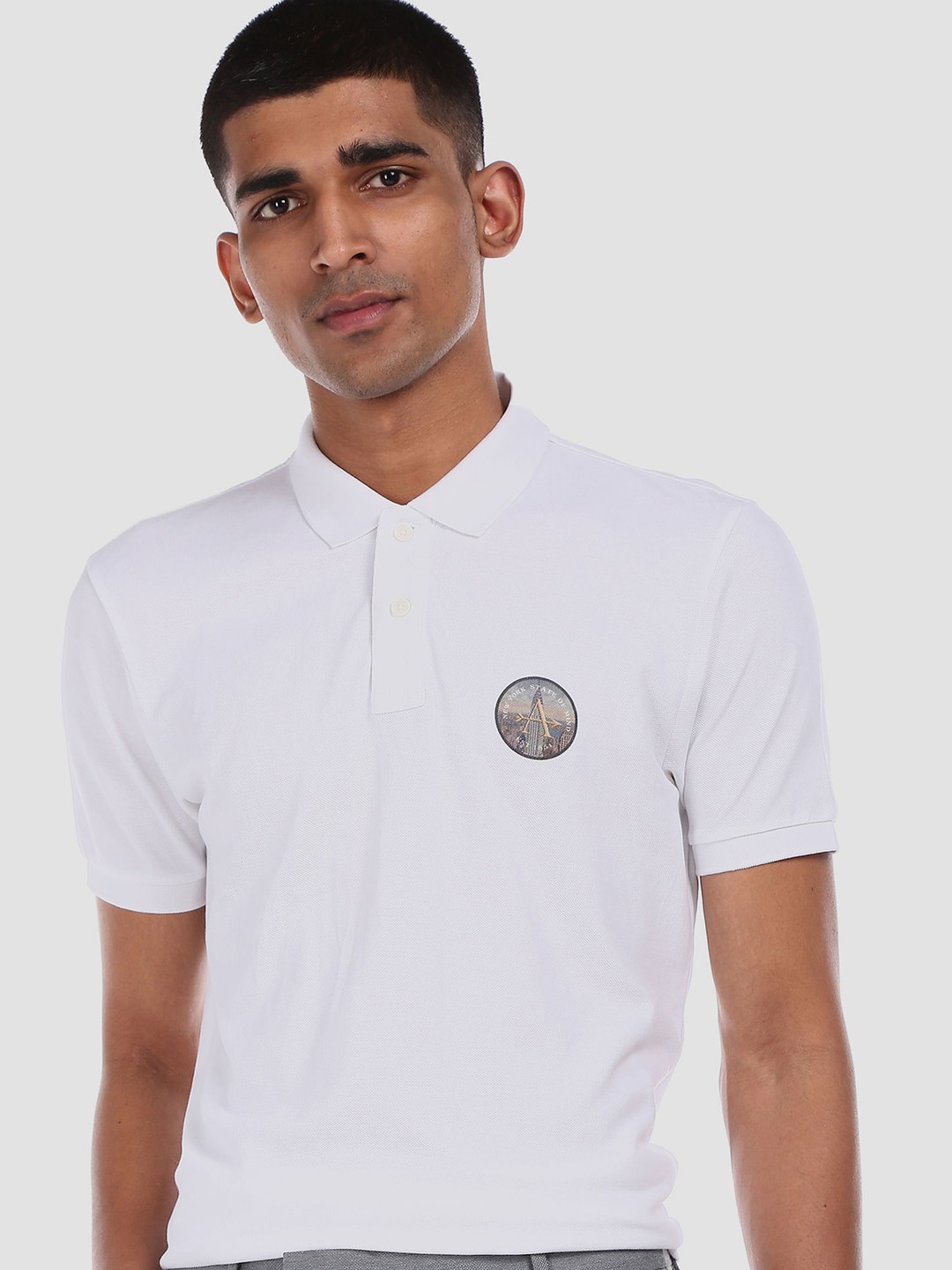 

Arrow Sport Men White Solid Polo Collar Pure Cotton T-shirt
