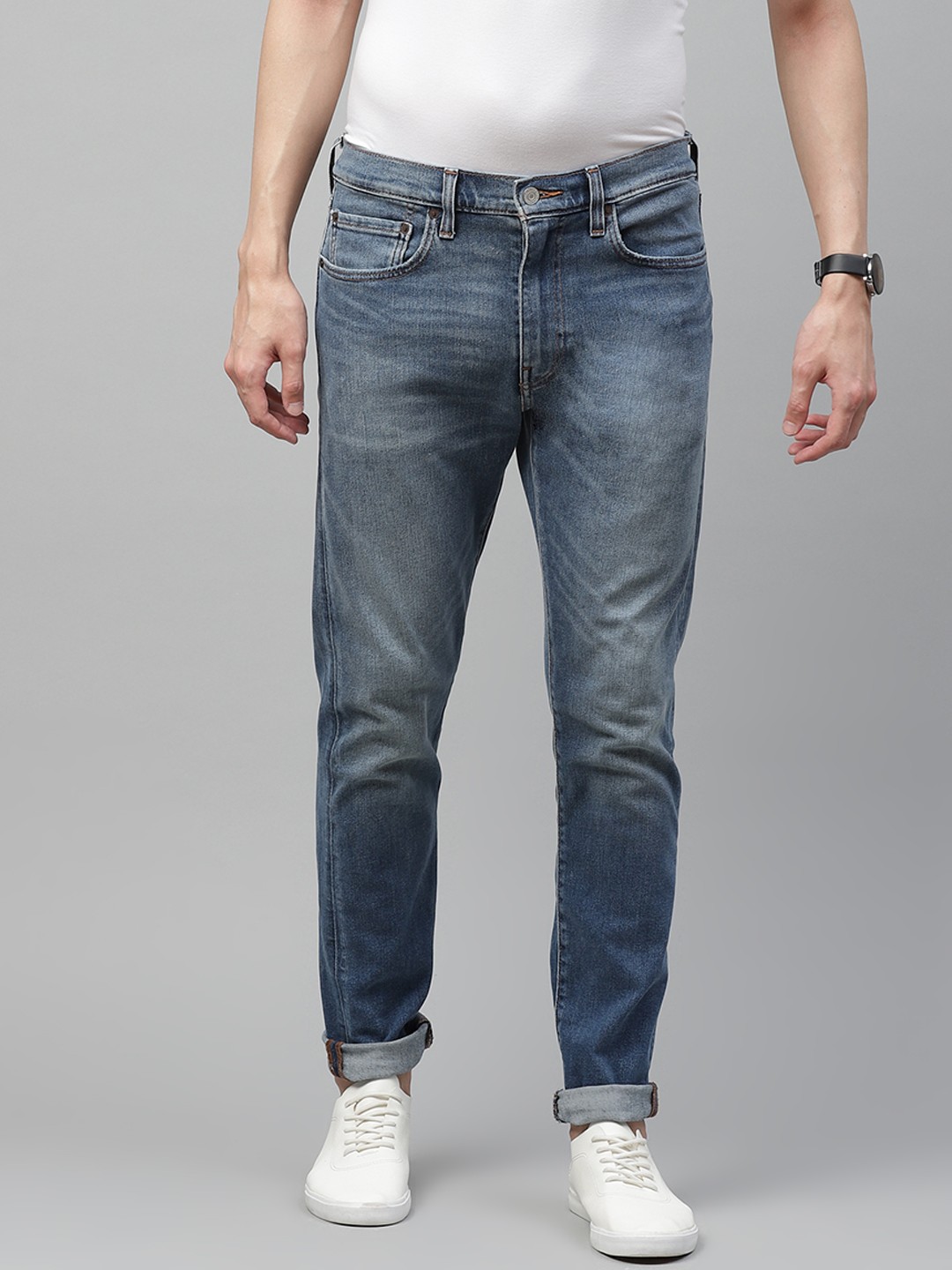 

Levis Men Blue Tapered Fit Light Fade Stretchable Sustainable Sustainable Jeans