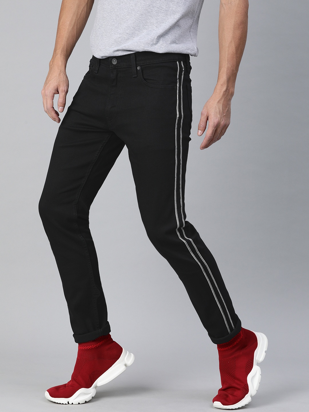 

Levis Men Black 512 Slim Tapered Fit Mid-Rise Stretchable Jeans With Side Sustainable Stripes