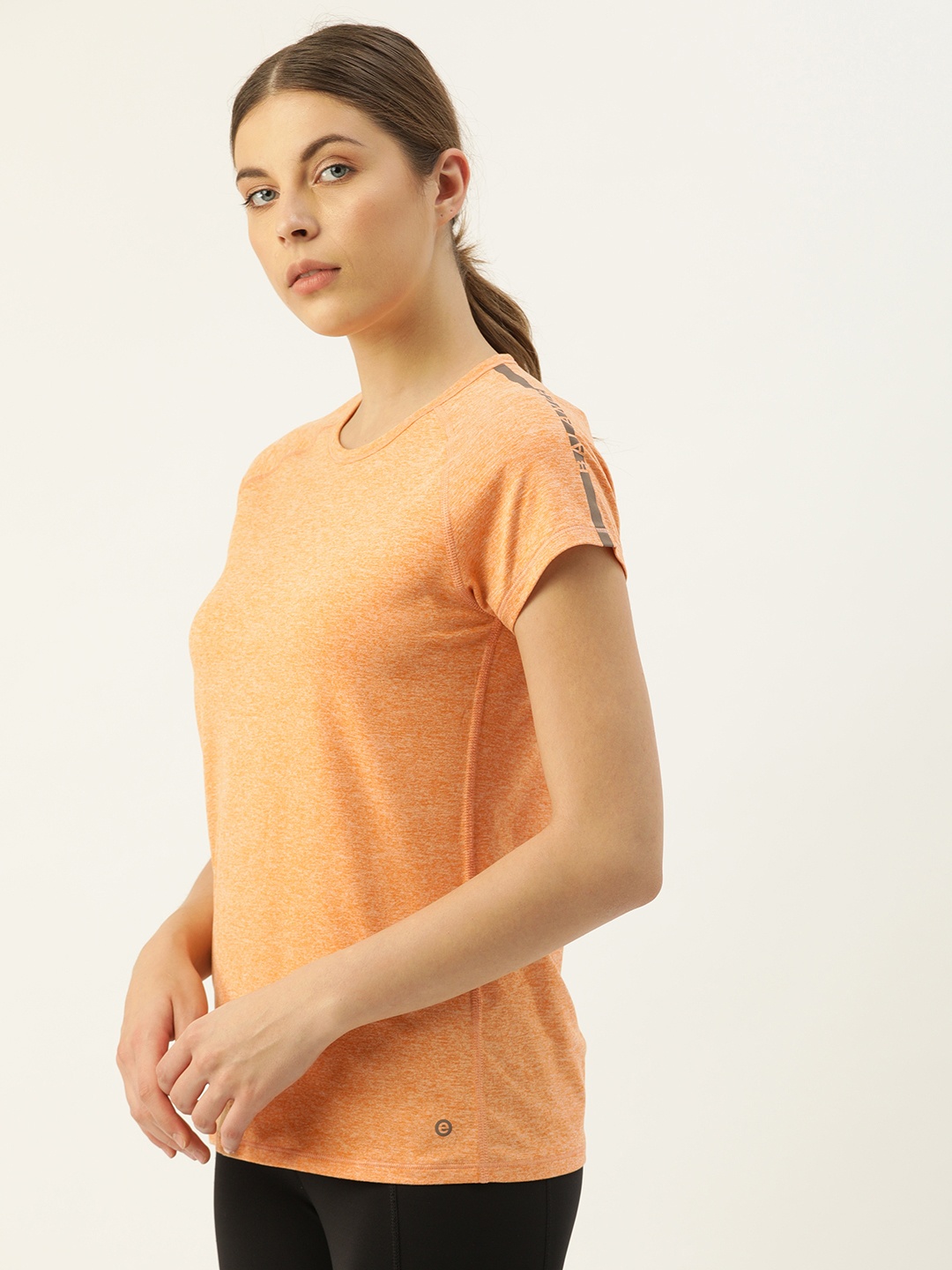 

"Enamor Women Peach Cider Solid Round Neck Slim Fit Rapid Dry and Antimicrobial T-shirt