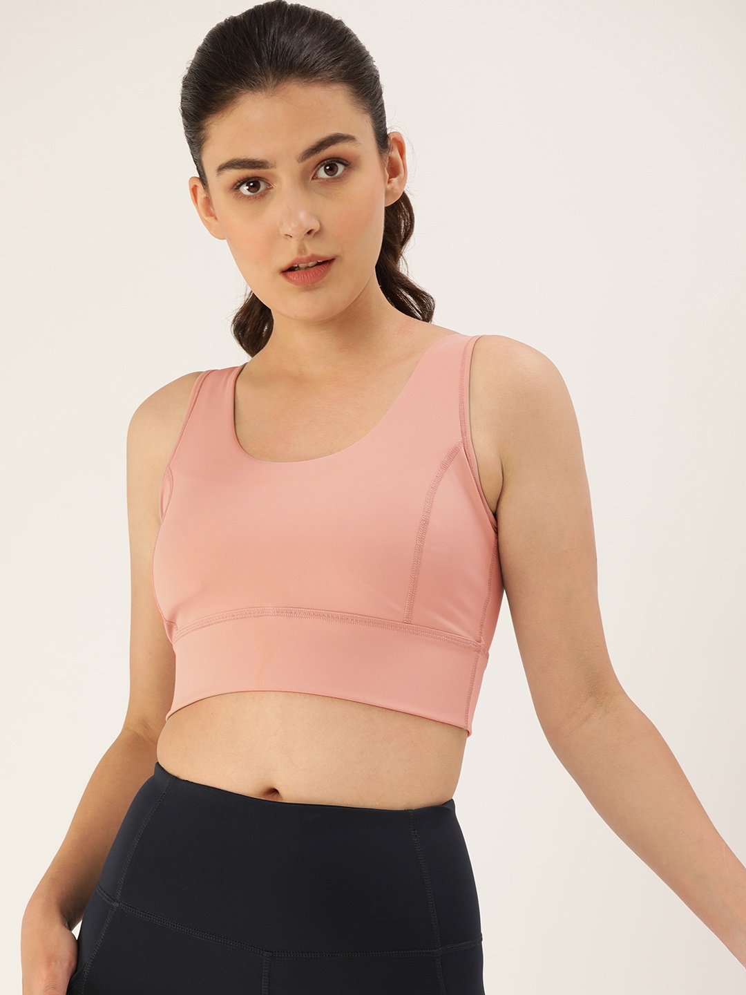 

Enamor Athleisure Peach Solid Non-Wired Removable Padding Workout Bra EEATOE117BRKL