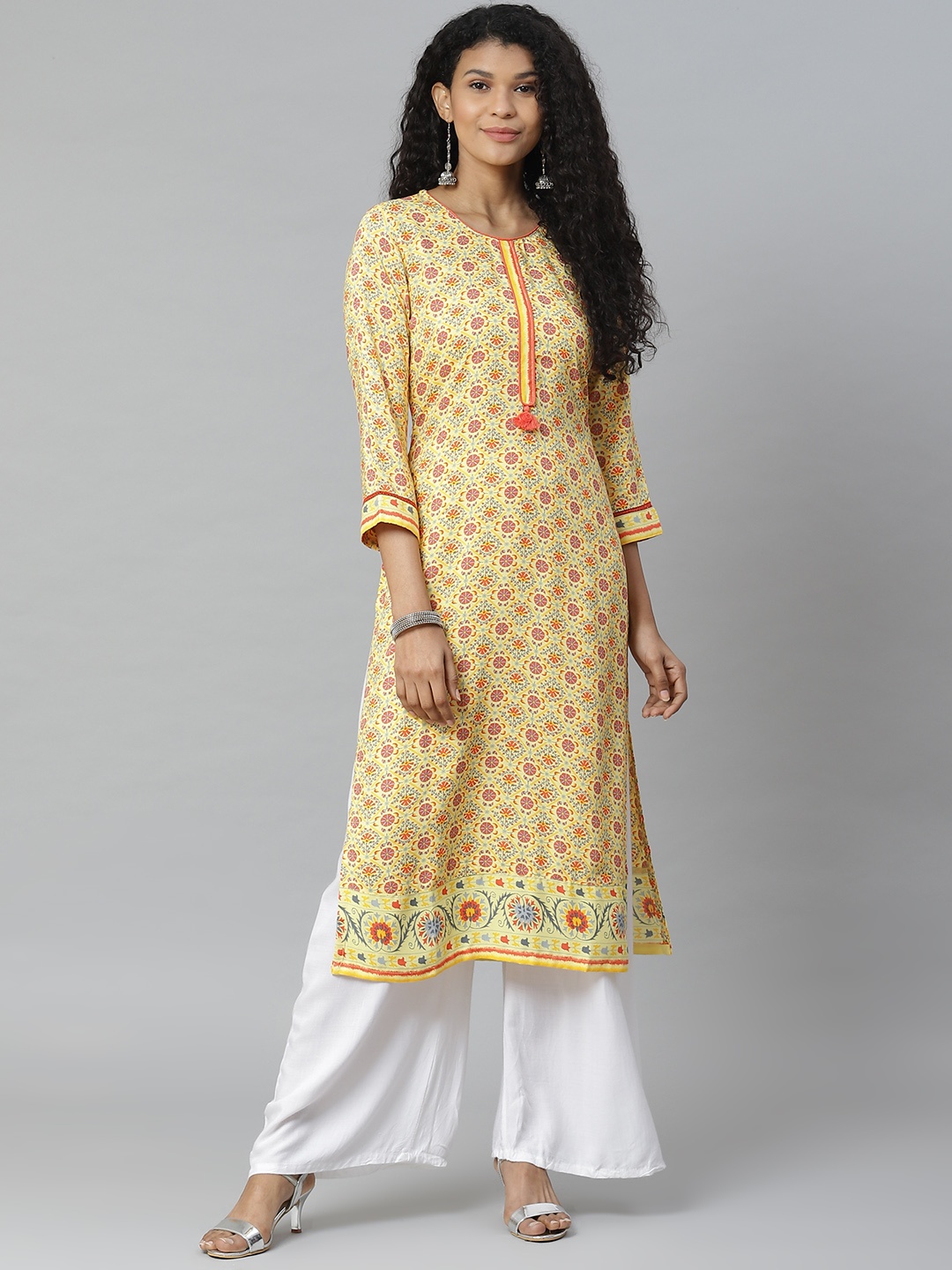 

Rangriti Women Yellow & Maroon Suzani Ikat Print Liva Straight Kurta