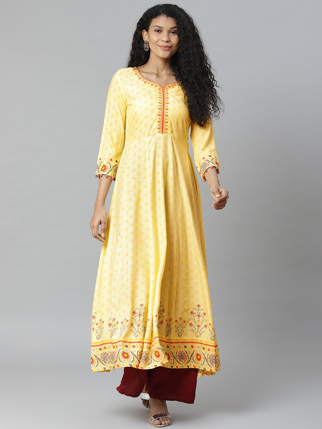 

Rangriti Women Yellow & Orange Printed Anarkali Kurta