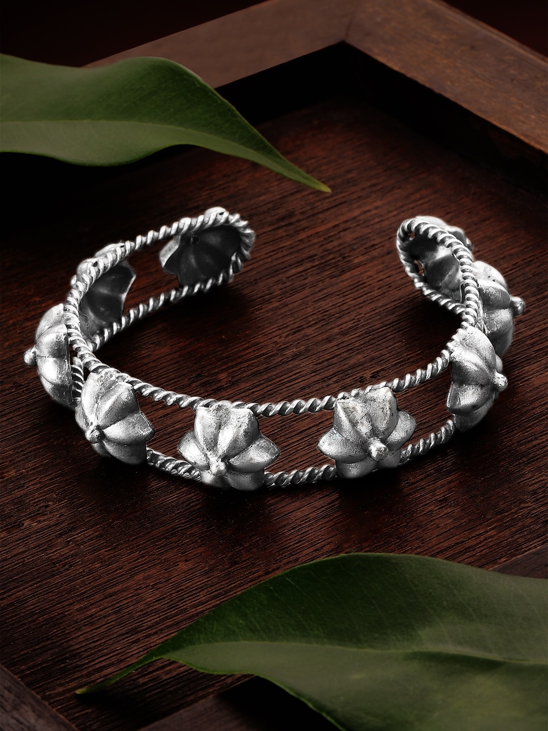 

Rubans Oxidised Silver-Plated Flower-Shaped Handcrafted Cuff Bracelet