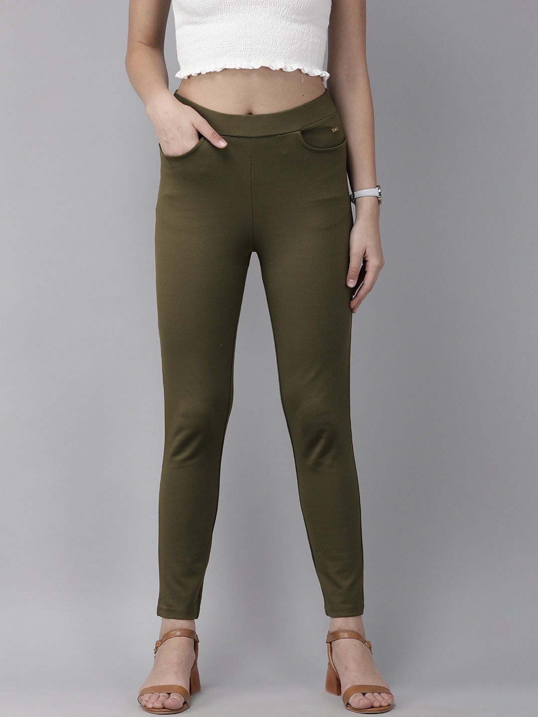 

Park Avenue Women Olive Green Solid Jeggings