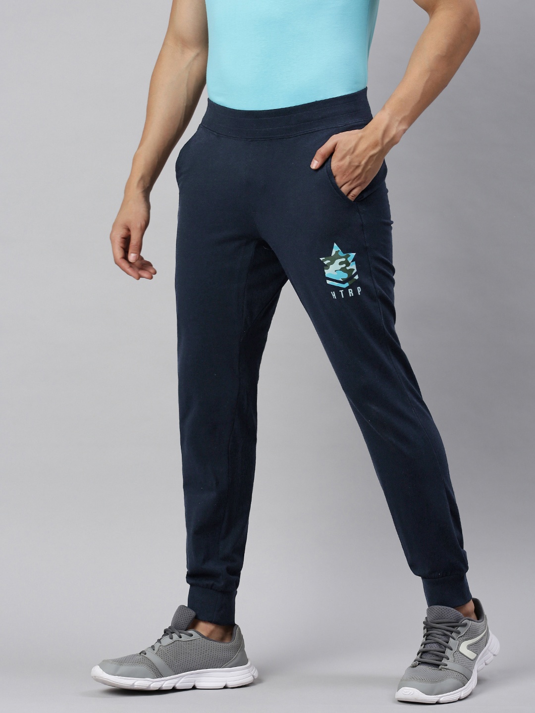 

Huetrap Men Navy Blue Solid Straight-Fit Joggers Sustainable with Printed Detail