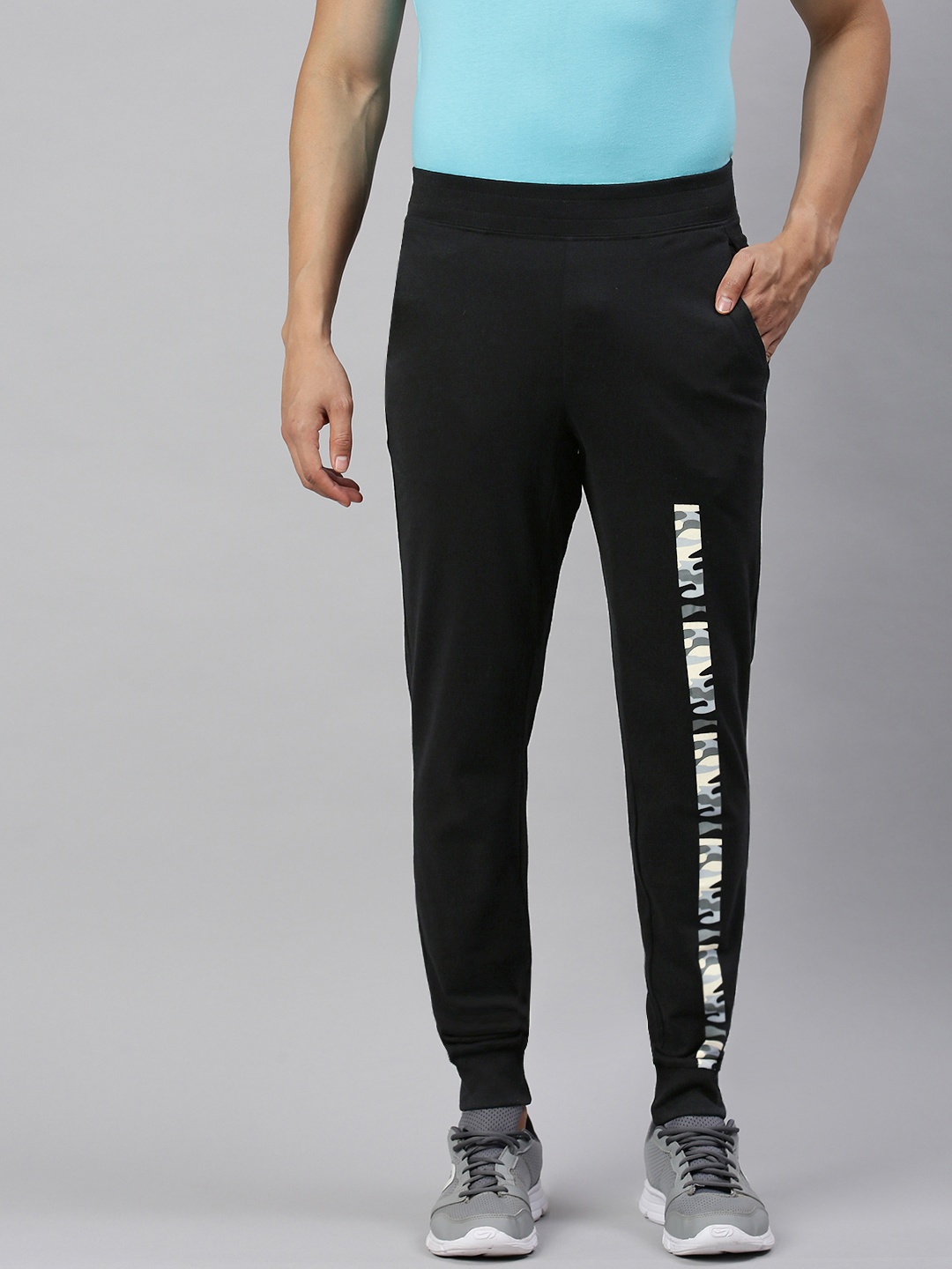 

Huetrap Men Black Solid Straight-Fit Sustainable Joggers with Printed Detail