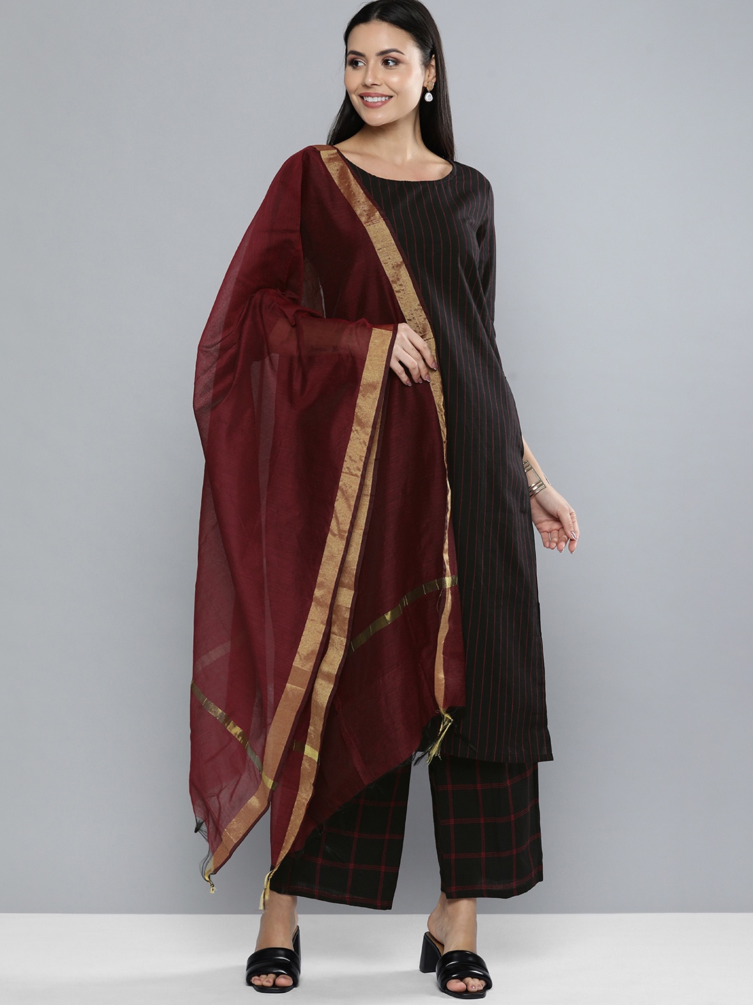 

Vishudh Women Black & Maroon Solid Kurta with Palazzos & Dupatta