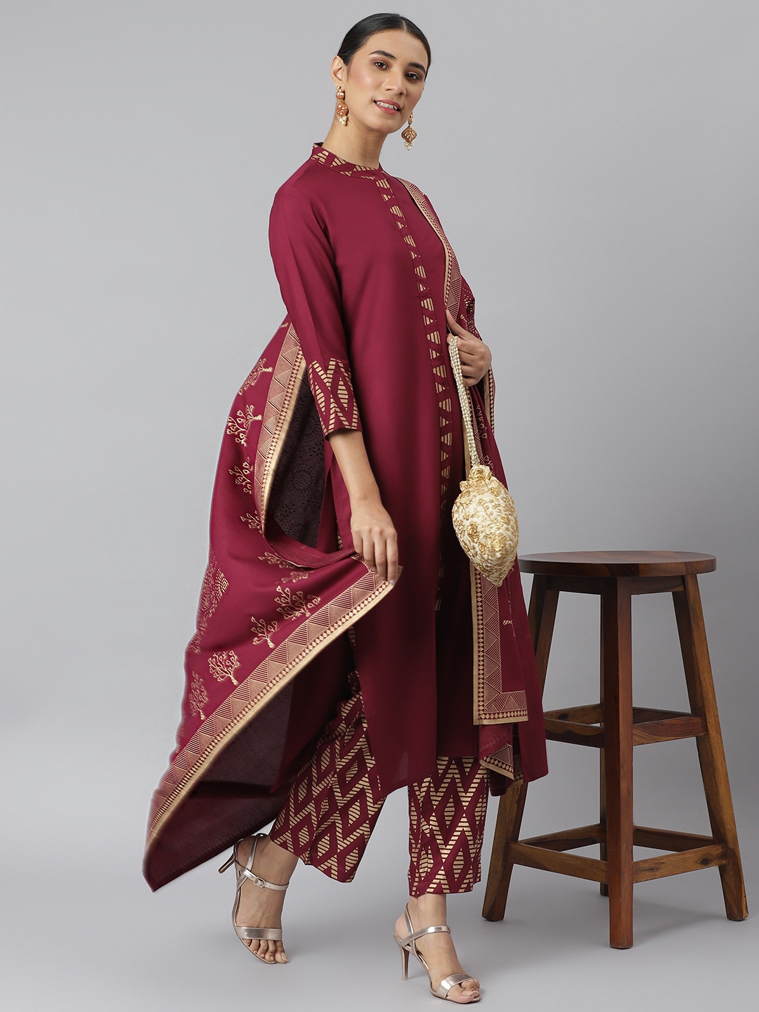 

Khushal K Women Maroon Solid Kurta with Trousers & Dupatta